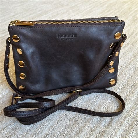 triple compartment leather crossbody.